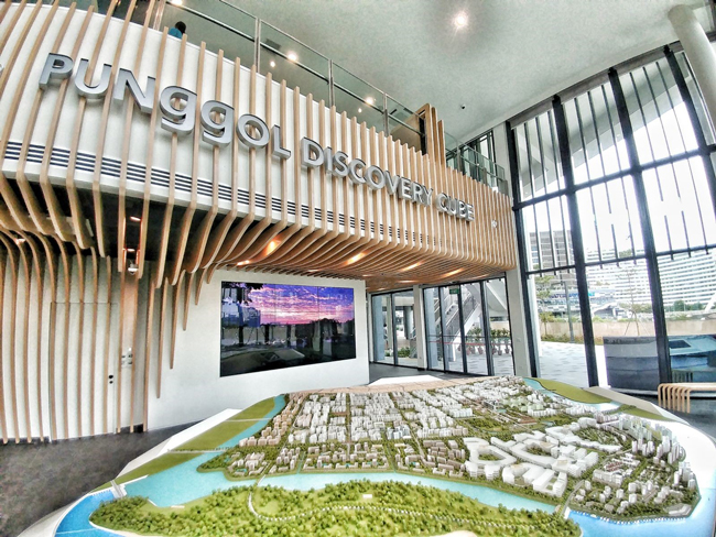 Interactive model of Punggol Town with touchscreen stations on the ground floor of Punggol Discovery Cube