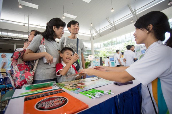 NEA educating members of public on the prevention of mosquito breeding at its booth.